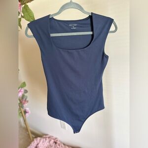 Nine west. Body suit. Navy blue. Women’s top size small.